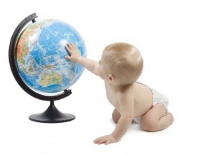Baby Touching Globe